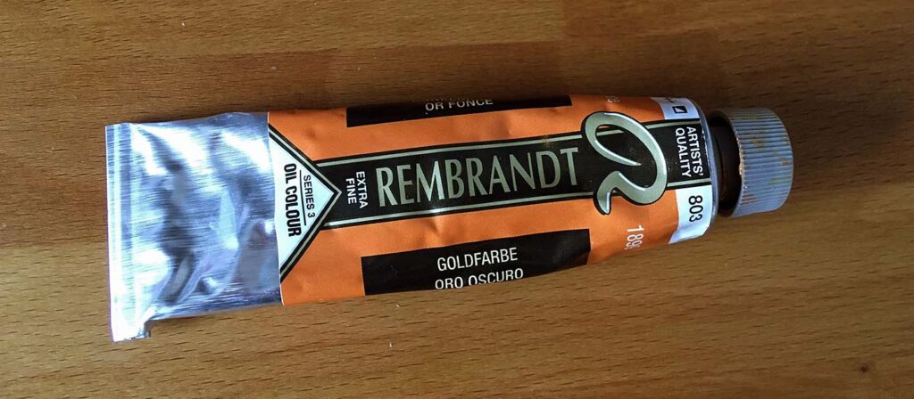 tube of golden Rembrandt oil paint