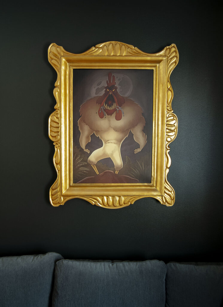 framed real life image of el pollo diablo hanging on a wall